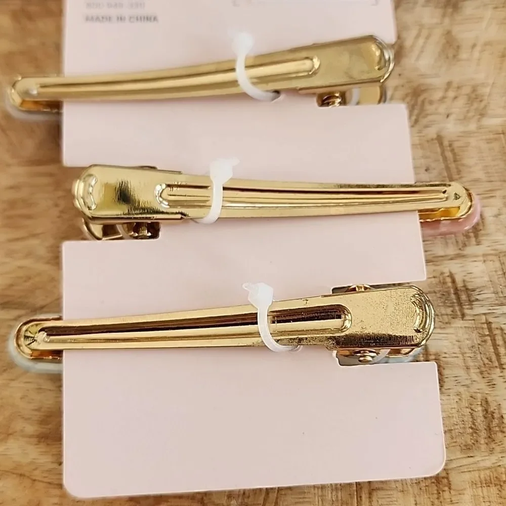 Three NWOT Hair Clips with Stay Put Grip Teeth